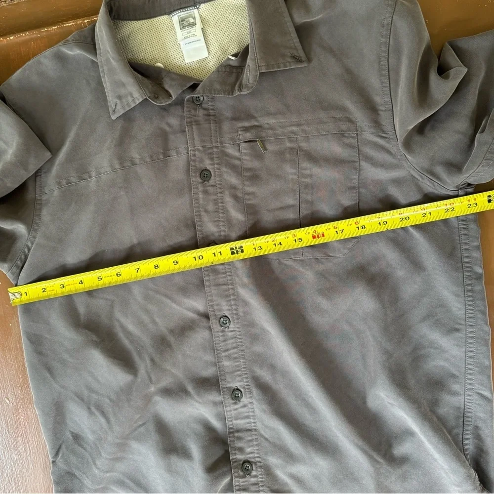 The NorthFace Gray button down shirt. Men’s Large